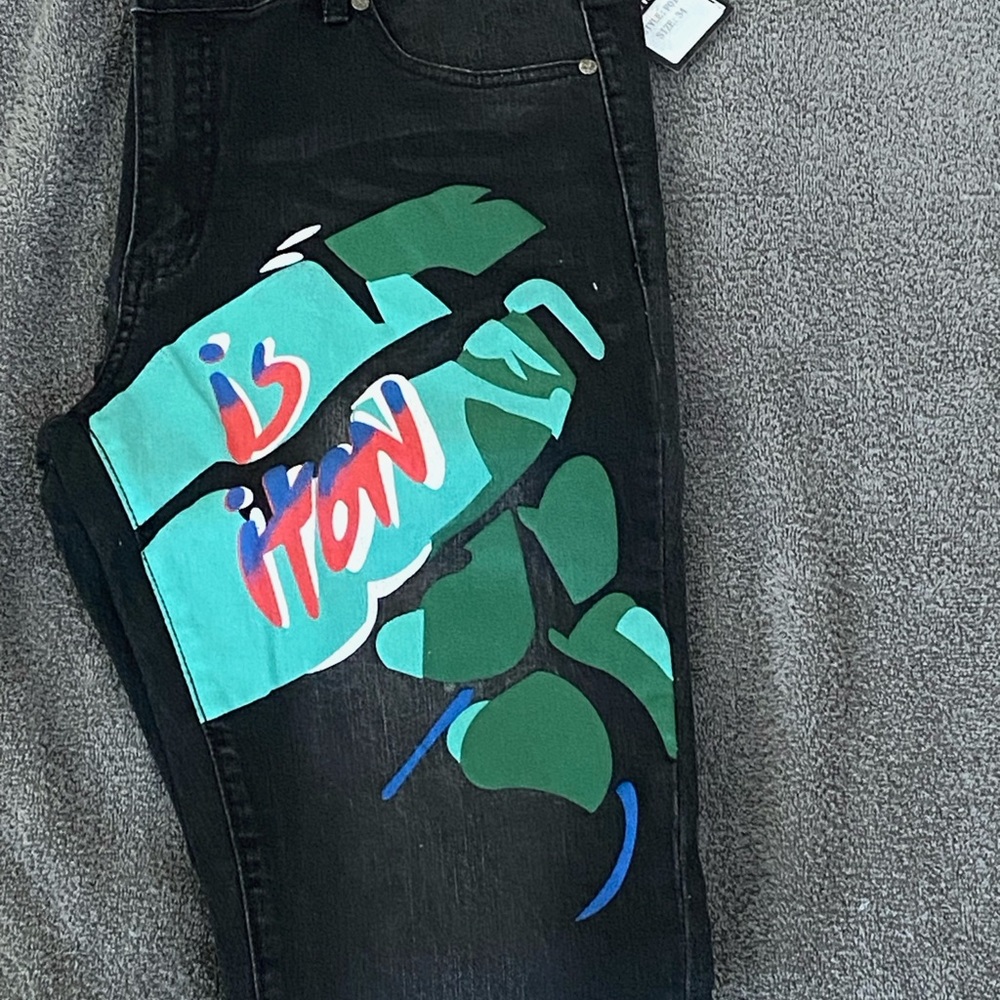Louis Vuitton Black Jeans with Vibrant Graphic